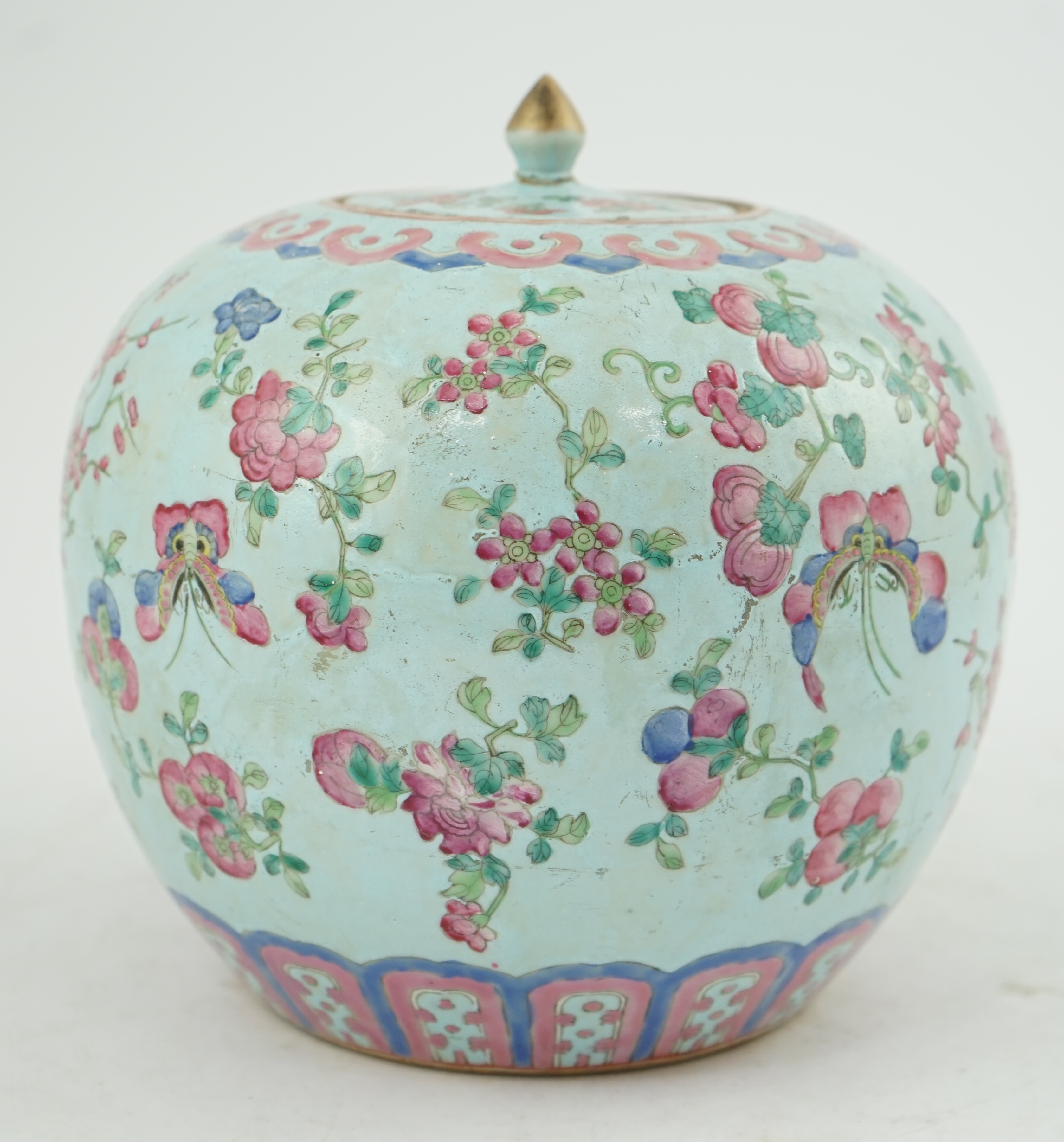 A Chinese turquoise ground famille rose jar and cover, late 19th century